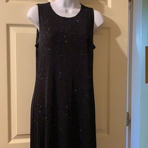 After five sleeveless black shimmer long dress.